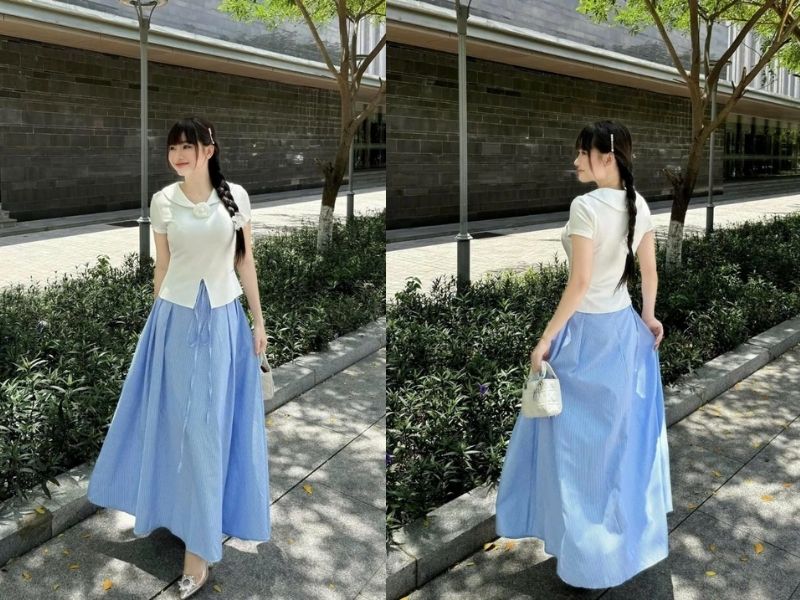 Chân váy xanh có thể mặc cùng áo blouse kem